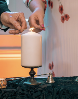 Unity candle being lit during one of Greg's real wedding ceremonies
