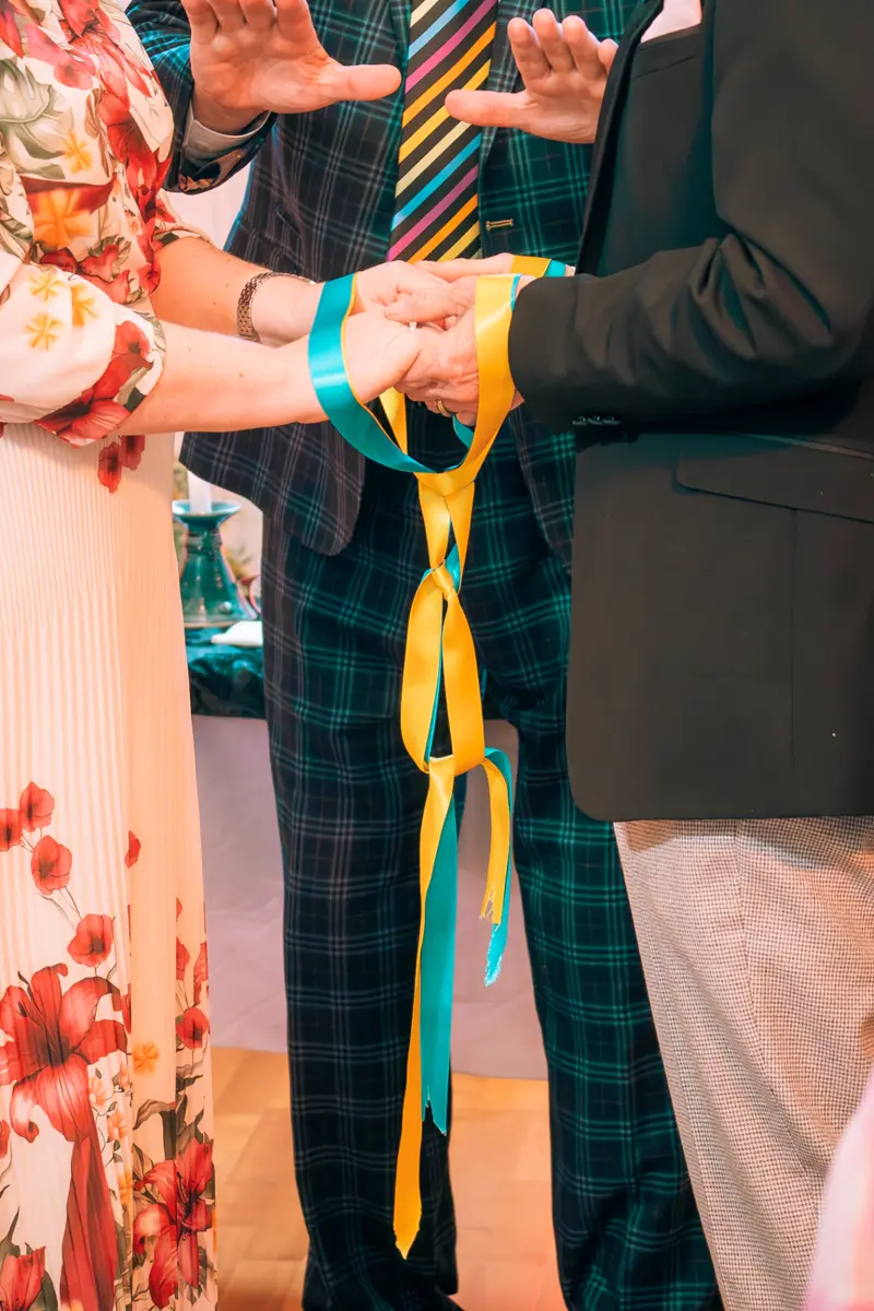 Handfasting ritual during an Irish wedding ceremony
