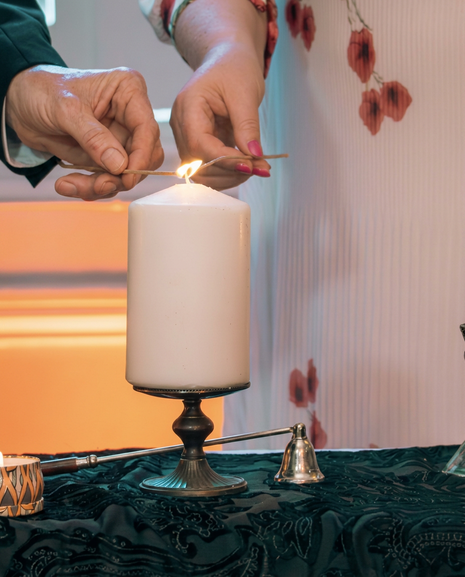 Unity candle being lit during one of Greg's real wedding ceremonies